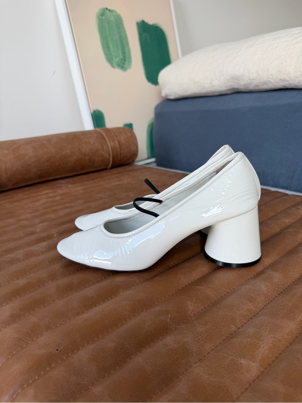 Khaite White Patent Mid Heel Pumps with Black Strap